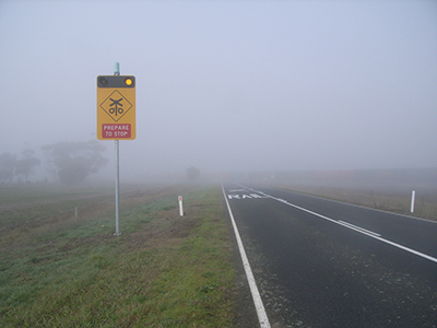Fog obstructing view of level crossing